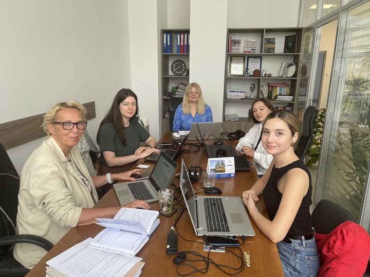 Optimum Web management team working together in the Chisinau office — software development company in Moldova